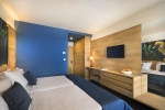 Кровать или кровати в номере Remisens Hotel Epidaurus