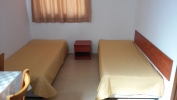 Кровать или кровати в номере Hotel Del Mar