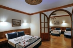 Кровать или кровати в номере Kleopatra Fatih Hotel