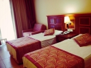 Кровать или кровати в номере Grand Nar Hotel