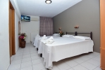Кровать или кровати в номере El Greco Beach Hotel