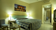 Кровать или кровати в номере Ephesia Holiday Beach Club