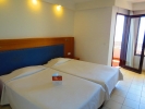 Кровать или кровати в номере ALFAMAR Beach & Sport Resort