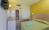 Кровать или кровати в номере Dessole Malia Beach - All Inclusive