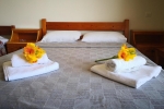 Кровать или кровати в номере Taradella Hotel