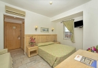 Кровать или кровати в номере Hotel Sinatra