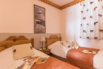 Кровать или кровати в номере Résidence Pierre & Vacances Premium Les Hauts Bois 