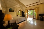 Кровать или кровати в номере Arya Amed Beach Resort and Dive Center