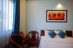 Кровать или кровати в номере Brenta Phu Quoc Hotel