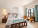 Кровать или кровати в номере Kiwengwa Beach Resort