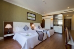 Кровать или кровати в номере Thien Thanh Resort