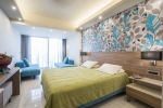 Кровать или кровати в номере Atrion Resort Hotel