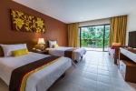 Кровать или кровати в номере Naithonburi Beach Resort