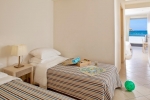 Кровать или кровати в номере Civitel Creta Beach