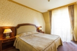 Кровать или кровати в номере Romance Splendid and SPA Hotel