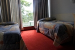 Кровать или кровати в номере Hotel Koral - Free Parking