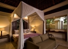 Кровать или кровати в номере Komaneka at Bisma Ubud