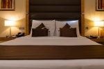 Кровать или кровати в номере Copthorne Hotel Sharjah