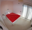 Кровать или кровати в номере Hotel Kompleks Joni