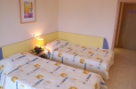 Кровать или кровати в номере Hotel Com - All Inclusive