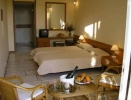 Кровать или кровати в номере Hotel Pavlina Beach