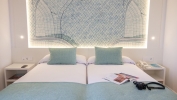 Кровать или кровати в номере Golden Taurus Aquapark Resort