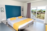 Кровать или кровати в номере Estival ElDorado Resort