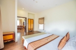 Кровать или кровати в номере Diamond Bay Resort & Spa
