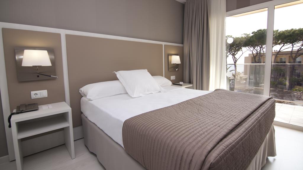 Отель Кровать или кровати в номере Estival Centurión Playa