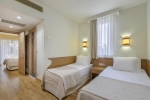 Кровать или кровати в номере Alva Donna Beach Resort Comfort