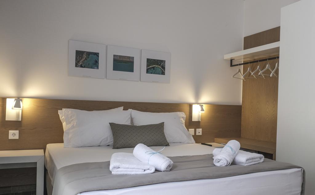 Отель Кровать или кровати в номере Hotel Vozina 