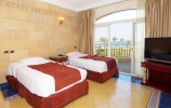 Кровать или кровати в номере Sentido Palm Royale Soma Bay