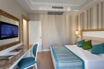 Кровать или кровати в номере Karmir Resort & Spa