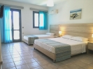 Кровать или кровати в номере Marilisa Hotel
