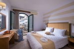 Кровать или кровати в номере Pela Maria Hotel