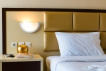 Кровать или кровати в номере Akoya Resort