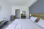 Кровать или кровати в номере Akoya Resort