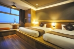 Кровать или кровати в номере Seasing Boutique Hotel