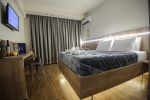 Кровать или кровати в номере Hotel Yakinthos