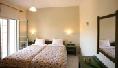 Кровать или кровати в номере Armonia Apartments 