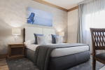 Кровать или кровати в номере VOI Grand Hotel Mazzarò Sea Palace