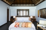 Кровать или кровати в номере Anantara Veli Maldives Resort