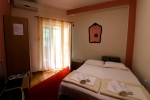 Кровать или кровати в номере Apartment Kralj 