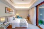 Кровать или кровати в номере Courtyard by Marriott Bali Nusa Dua Resort