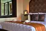 Кровать или кровати в номере Ayodya Resort Bali