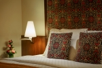Кровать или кровати в номере Ayodya Resort Bali