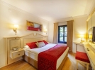 Кровать или кровати в номере Sunrise Resort Hotel