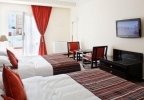 Кровать или кровати в номере Atlantic Palace Agadir Golf Thalasso & Casino Resort