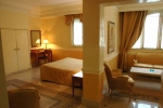 Кровать или кровати в номере Hellenia Yachting Hotel