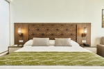 Кровать или кровати в номере Riu Atoll-All Inclusive